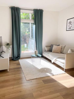 +STADTRUHE+ Niedliche Appartment mit Garten